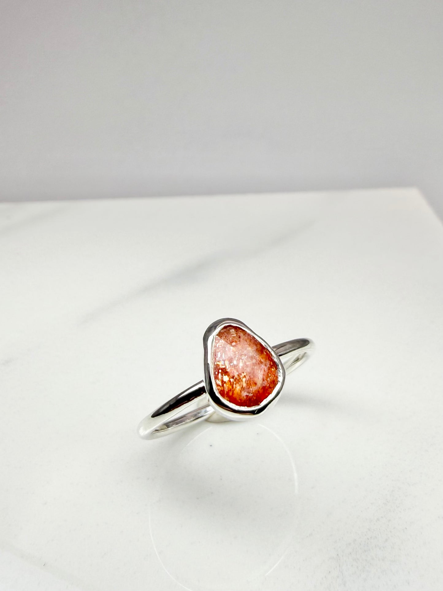 Sun stone ring size O