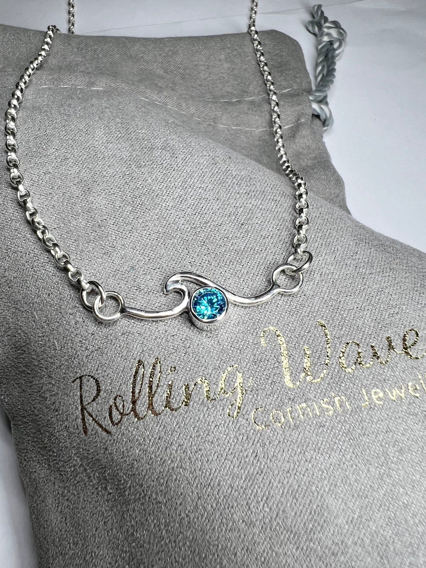 Cubic zirconia rolling wave necklace