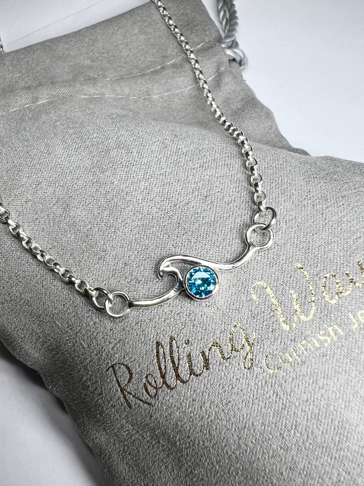 Cubic zirconia rolling wave necklace