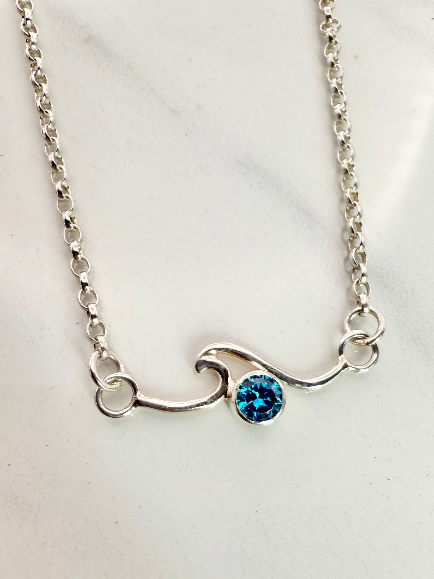 Cubic zirconia rolling wave necklace