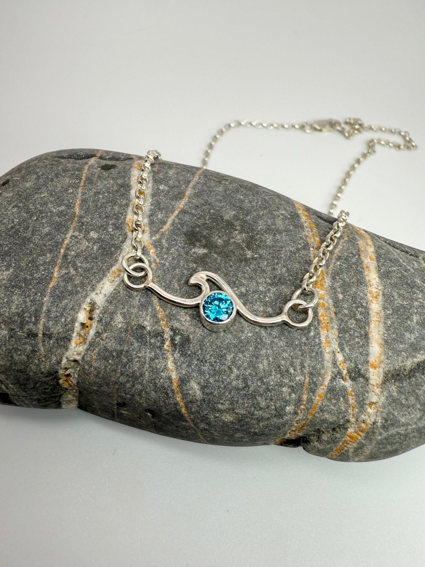 Cubic zirconia rolling wave necklace