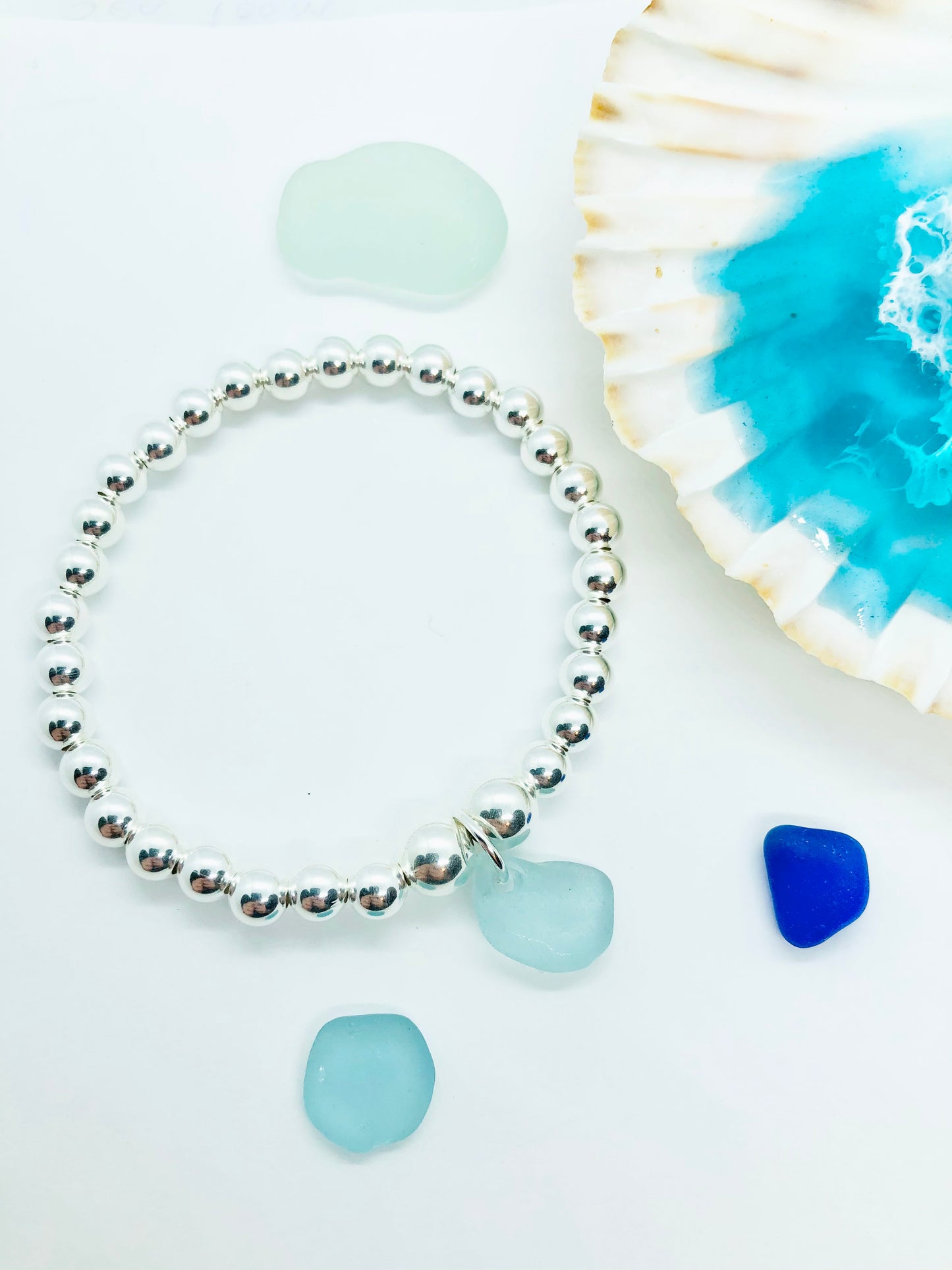 Sterling silver beaded bracelet with a Cornish sea glass charm